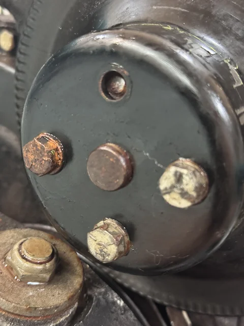 Busted waterpump bolt.  I will fix this later.
