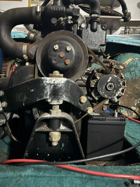 Yum... Off to the scrap yard with some of this.  New alternator, fix the waterpump bolt, paint, etc.  
