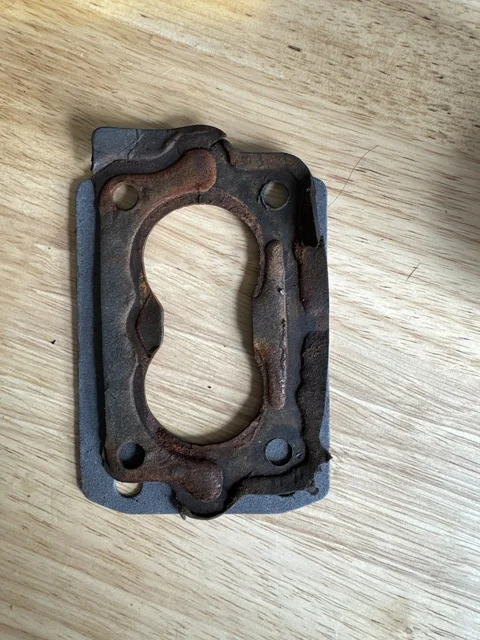 Carb gasket.  This carb is proving to be a unicorn.  My neighbor rebuilt it for me (perfectly), but I'll want to upgrade this ol' Rochester 2 carb at some point