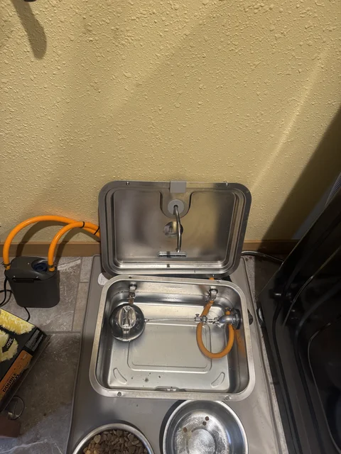 Automatic dog water dish and canister filter setup. With the top down, it creates a fountain. 