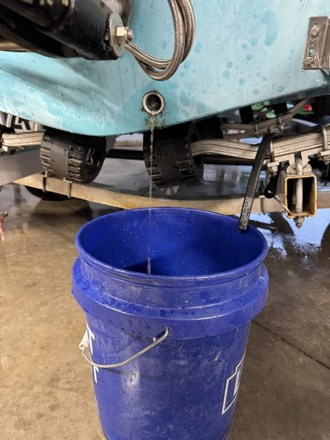 Draining the bilge after we got it home. 