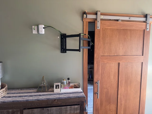 I wanted the TV to swing into the bathroom…