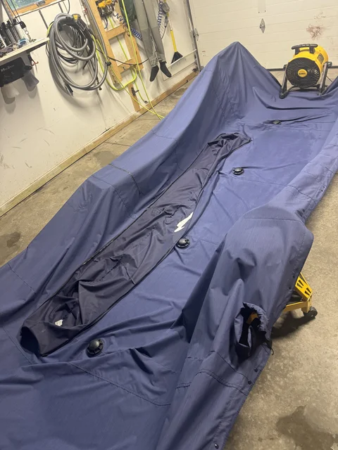 Sealing the pontoon cover. I spent all weekend cleaning and clearing the garage so I could strip the garage floor clean to wash and apply sealant. I’ve got to find a better way to do this. What a pain.  I hadn’t cleaned cleaned the floor since we moved in. It wasn’t bad at all then. It looked like a murder scene after a few years with clumsy me. 