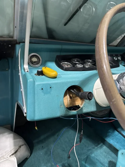 I'll have to find something that goes in this hole.  A Rockford Fosgate PMX1 would work, or a better version of it...hmm.  That would solve a few problems... Full amp, bluetooth, sub line out.  Hmm.