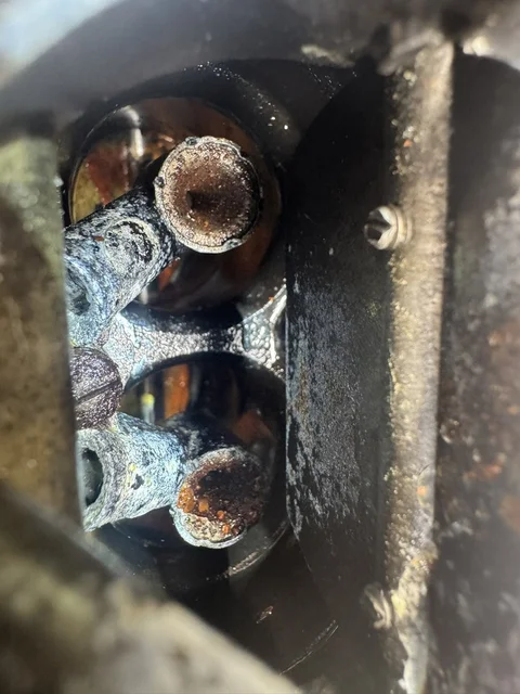 Carb, that's not good.  My neighbor Jim rebuilt the carb for me, thankfully :-)