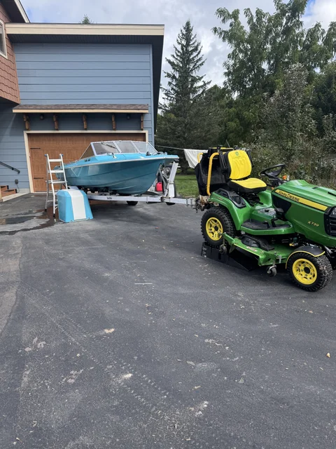 I couldn't get it high enough to drain all the crud out of the back (oil/etc).  Tractor and car lifts do the trick.